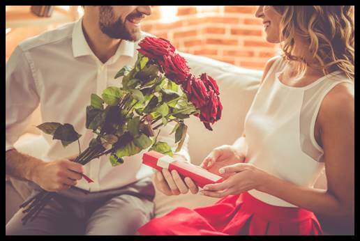 Gentleman giving a female flowers